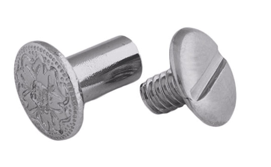 Decorative silver screw with floral pattern head.